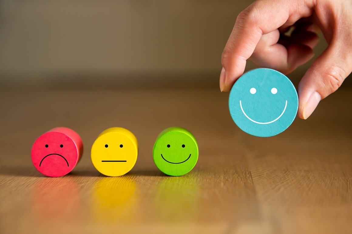 Four colorful smileys, from unhappy to smiling; copyright:...