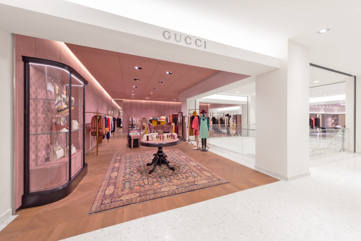 Gucci store, pink colors, minimalist  furnishing