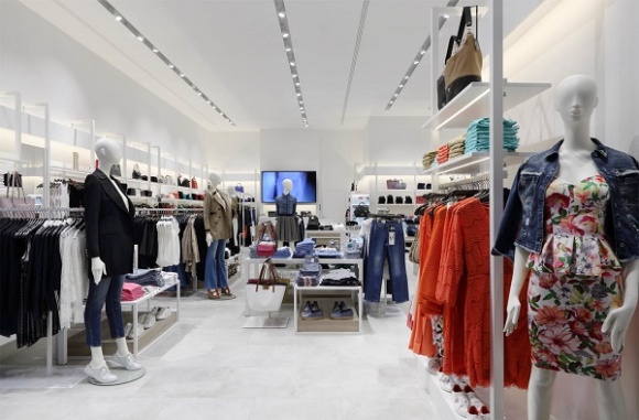 The new GUESS store in the Europeisky Mall will welcome customers in an...